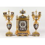 A 19TH CENTURY FRENCH ORMOLU AND PORCELAIN CLOCK GARNITURE, the clock with orb finial, porcelain and