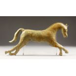 AN EARLY PAINTED METAL WEATHER VANE, modelled as a prancing horse. 15ins long.
