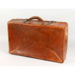 A LEATHER REVELATION SUITCASE. 24ins long.