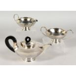 A GOOD ART DECO SILVER CIRCULAR THREE PIECE TEA SET. Sterling. 24ozs.