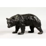 A GOOD QUALITY RUSSIAN BRONZE BEAR FIGURE in a naturalistic pose. 8ins long.