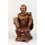 A CARVED AND PAINTED GROUP, "Moses Holding a Tablet", possibly 18th century. 18ins high.