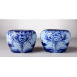 A VERY GOOD PAIR OF MOORCROFT POTTERY FLORIAN WARE BULBOUS BOWLS, blue ground. Printed Florian