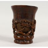 A CHINESE CARVED HORN CUP. 4ins high.
