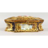 A SUPERB CONTINENTAL PORCELAIN SHAPED CASKET AND COVER, rich dark blue ground with gold