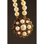 A GOOD PEARL CHOKER, with gold and pearl clasp.