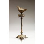 A BYZANTINE BRONZE LAMP AND STAND, 6TH CENTURY. 13ins high.