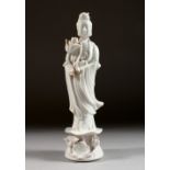 A CHINESE BLANC-DE-CHINE FIGURE OF GUANYIN. 8ins high.