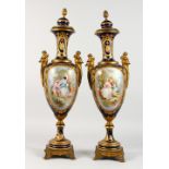 A SUPERB PAIR OF LARGE SEVRES RICH DARK BLUE GROUND VASES AND COVERS, with ormolu mounts,