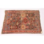 A PERSIAN BIDJAR RUG, EARLY 20TH CENTURY, Garous design, rust ground with stylised decoration. 5ft