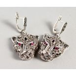 A PAIR OF RUBY SET PANTHER EARRINGS.