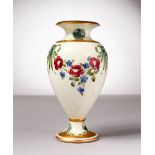 A MOORCROFT POTTERY MACINTYRE VASE, garland of roses and ribbons. Script signature W. Moorcroft in