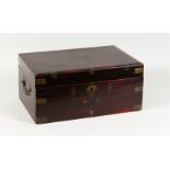 A LATE 19TH CENTURY ANGLO INDIAN BRASS BOUND TEAK WRITING BOX, with fitted interior. 17.75ins wide.