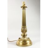 A GOOD ORNATE BRASS TABLE LAMP BASE. 17.5ins high including fitting.