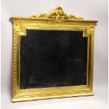 A GILT FRAMED OVER MANTLE MIRROR. 4’6” H x 4’7” W