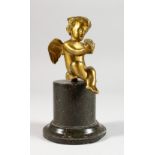 A GILT BRONZE CHERUB, on a circular marble base. 6ins high.