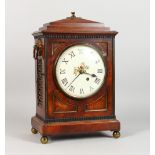 A REGENCY MAHOGANY BRACKET CLOCK, with chain fusee movement, painted circular dial in an