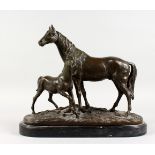 AFTER P. J. MENE A LARGE BRONZE GROUP, MARE AND FOAL. Signed P. J. MENE, on a naturalistic base with