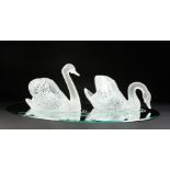 A SUPERB LALIQUE SWAN TABLE CENTREPIECE formed as two swans, 14ins long, standing on a large oval