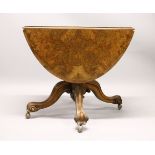 A VICTORIAN FIGURED WALNUT DROP LEAF TABLE, on a turned column with four curving legs. 4ft 6ins x