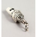 A TINY NOVELTY SILVER DOG'S HEAD WHISTLE.