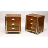 A GOOD PAIR OF BRASS BOUND LEATHER UPHOLSTERED THREE DRAWER CHESTS.