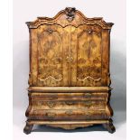 A GOOD 18TH CENTURY FRENCH OAK PRESS CUPBOARD, with a carved and moulded cornice, two panelled