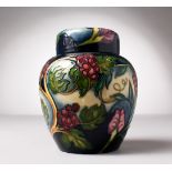 A MOORCROFT POTTERY GINGER JAR AND COVER. Made for The Tempest, B&W Thornton, Stratford-upon-Avon.