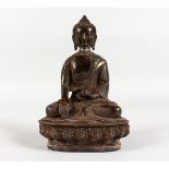 AN EARLY BRONZE SEATED BUDDHA. 8ins high.