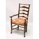 A GOOD 18TH CENTURY OAK LADDER BACK ARMCHAIR, with rushwork seat.