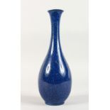 A SEVRES PORCELAIN BOTTLE VASE, with speckled blue ground decoration. 9.75ins high.