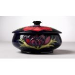 A MOORCROFT POTTERY CIRCULAR POWDER BOWL AND COVER, 34194. 5ins diameter.