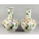 A LARGE PAIR OF CHINESE FLORAL DECORATED VASES.