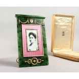 A SUPERB RUSSIAN GOLD AND JADE EASEL PHOTOGRAPH FRAME, with enamel surround. 7.75ins x 4.5ins, in