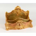 A SUPERB FRENCH ORMOLU DESK TIDY by RAMBAUD SUSSE, two-division with mask, scrolls and acanthus.