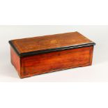 A 19TH CENTURY MUSIC BOX, playing eight airs, in an inlaid rosewood case. 19.5ins wide x 6.5ins high