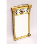 A SMALL REGENCY GILT FRAMED PIER MIRROR, with reverse painted frieze. 22.25ins high x 12.75ins