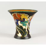 A DUTCH GOUDA POTTERY TRUMPET SHAPED VASE, with painted stylised decoration. 8.5ins high.
