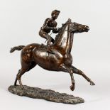 P. WHEATLEY A GOOD BRONZE GROUP, HORSE AND JOCKEY. Signed, on a naturalistic base. 16ins long x