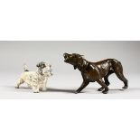 TWO CAST METAL MODELS OF DOGS. 3ins and 4ins long.