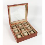 A GOOD LEATHER WATCH BOX with nine compartments.