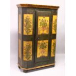 AN 18TH/19TH CENTURY AUSTRIAN PAINTED PINE CUPBOARD, with a single door, canted sides, all painted