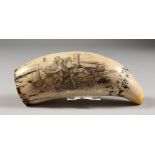 A RESIN REPRODUCTION WHALE TOOTH IN THE STYLE OF SCRIMSHAW. 7ins long.