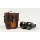A PAIR OF 19TH CENTURY LEATHER CASED BINOCULARS, with presentation plaque: "THAMES NAUTICAL TRAINING