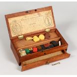 A 19TH CENTURY MAHOGANY ARTISTS BOX, with hinged lid and a small drawer, the lid with makers label