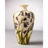A MOORCROFT POTTERY VASE, cream ground with bluebells. 2001. 120/300. 6ins high.