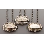 A SET OF THREE PLATED DECANTER LABELS, Port, Sherry and Vieux.