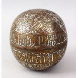 A FINE ISLAMIC SILVER INLAID ROUND BOX, with bands of calligraphy and geometric design, 12.5cm