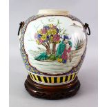 A 19TH CENTURY CHINESE FAMILLE ROSE PORCELAIN GINGER JAR & STAND, the body o the vase decorated with