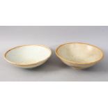 A GOOD PAIR OF EARLY CHINESE POTTERY BOWLS, 16cm diameter.